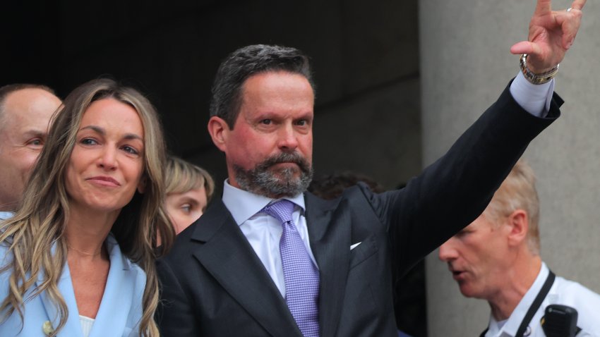 Dedham, MA – June 18: Karen Read and lawyer Alan Jackson emerge after her trial outside Norfolk Superior Court on June 18, 2025. (Photo by Lane Turner/The Boston Globe via Getty Images)
