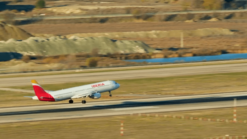 A shot of an Iberia Airlines flight taking off.