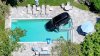 PHOTO: SUV crashes into pool on Cape Cod
