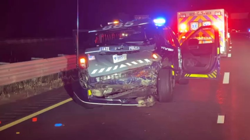 The mangled back of a Massachusetts State Police cruiser after a crash on I-95 in Topsfield on July 23, 2025.