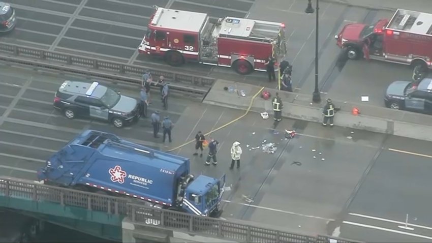 A trash truck crashed on the side of the Alford Street Bridge at the Everett/Charlestown line.