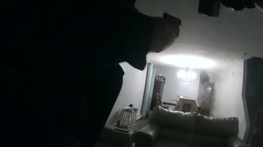 A still from police bodycam video showing a shootout with a man during a standoff at a residence in Fall River, Massachusetts, on Tuesday, July 15, 2025.