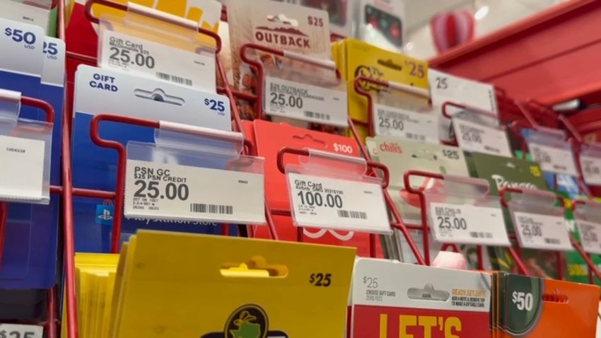 Gift cards stacked at the store for purchase.
