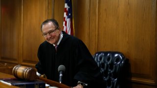 File. Judge Frank Caprio smiles as he concludes his morning session inside Municipal Court at the Providence Police Station in Providence, Ri on Oct. 30, 2017.