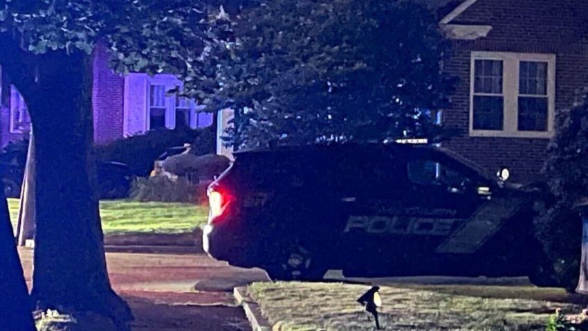 A photo from a neighbor shows Methuen police investigating a carjacking on East Prospect and Coolidge streets early Friday.