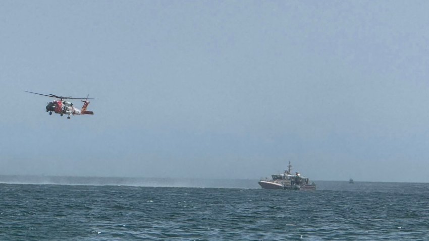 A photo shows emergency crews searching the water off Nantasket Beach in Hull, Massachusetts, on Aug. 9, 2025.