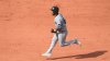 Fan at Fenway Park ejected after heckling Marlins' Dane Myers, who hit tying homer in 9th inning