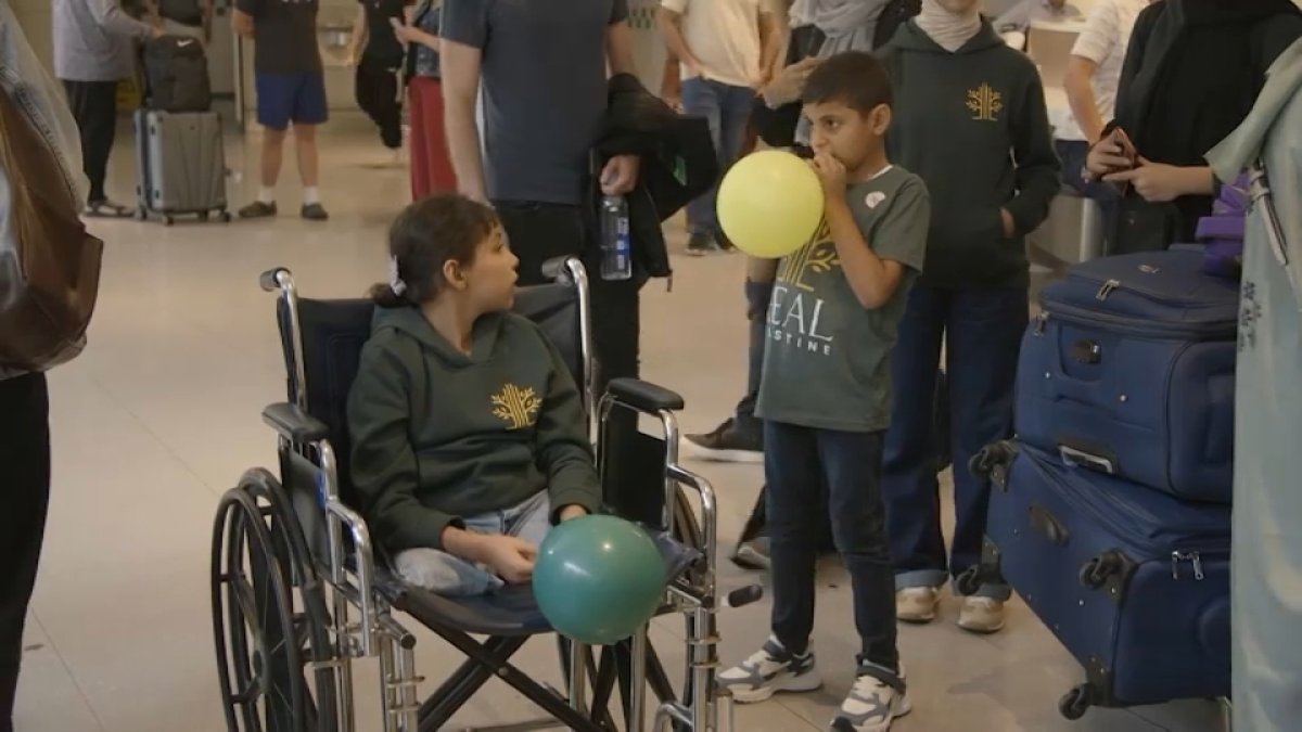 Girls from Gaza arrive at Boston airport for medical treatment in US