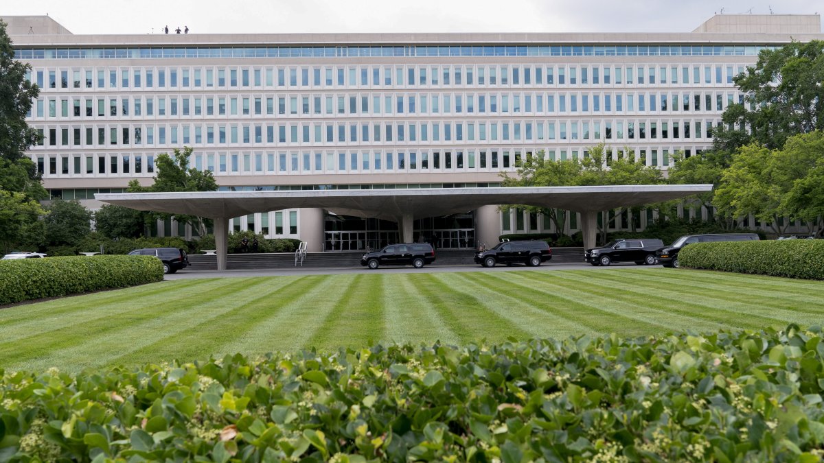Why Did Construction Workers Climb Fences at CIA Headquarters During ICE Raid?