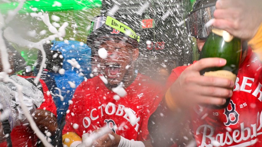 Sep 26, 2025; Boston, Massachusetts, USA; Boston Red Sox center fielder Ceddanne Rafaela (3) celebrates clinching a playoff spot with teammates after their game against the Detroit Tigers at Fenway Park. Mandatory Credit: Eric Canha-Imagn Images