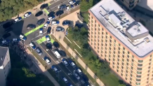A large police presence seen at the UMass Boston dorm Residence Hall West on Thursday, Sept. 11, 2025.