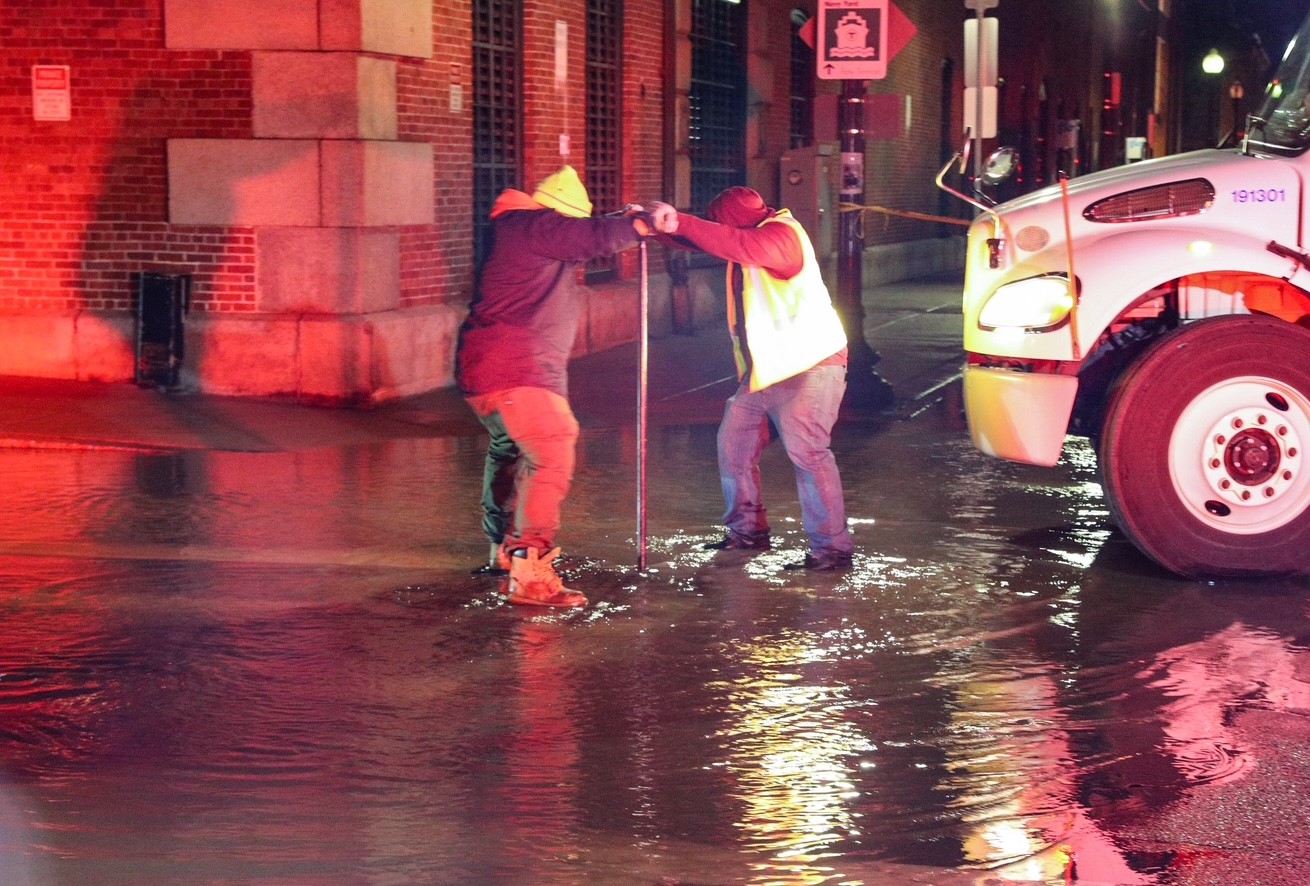 Large water main break in Charlestown floods road
