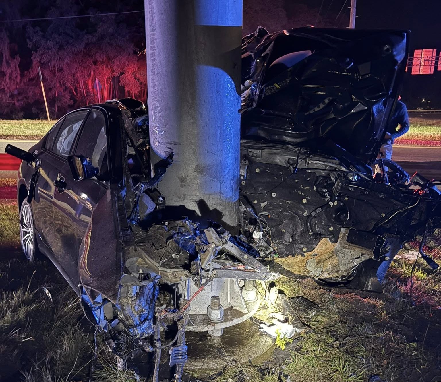 Driver taken to trauma center after car crashes into pole in Woburn