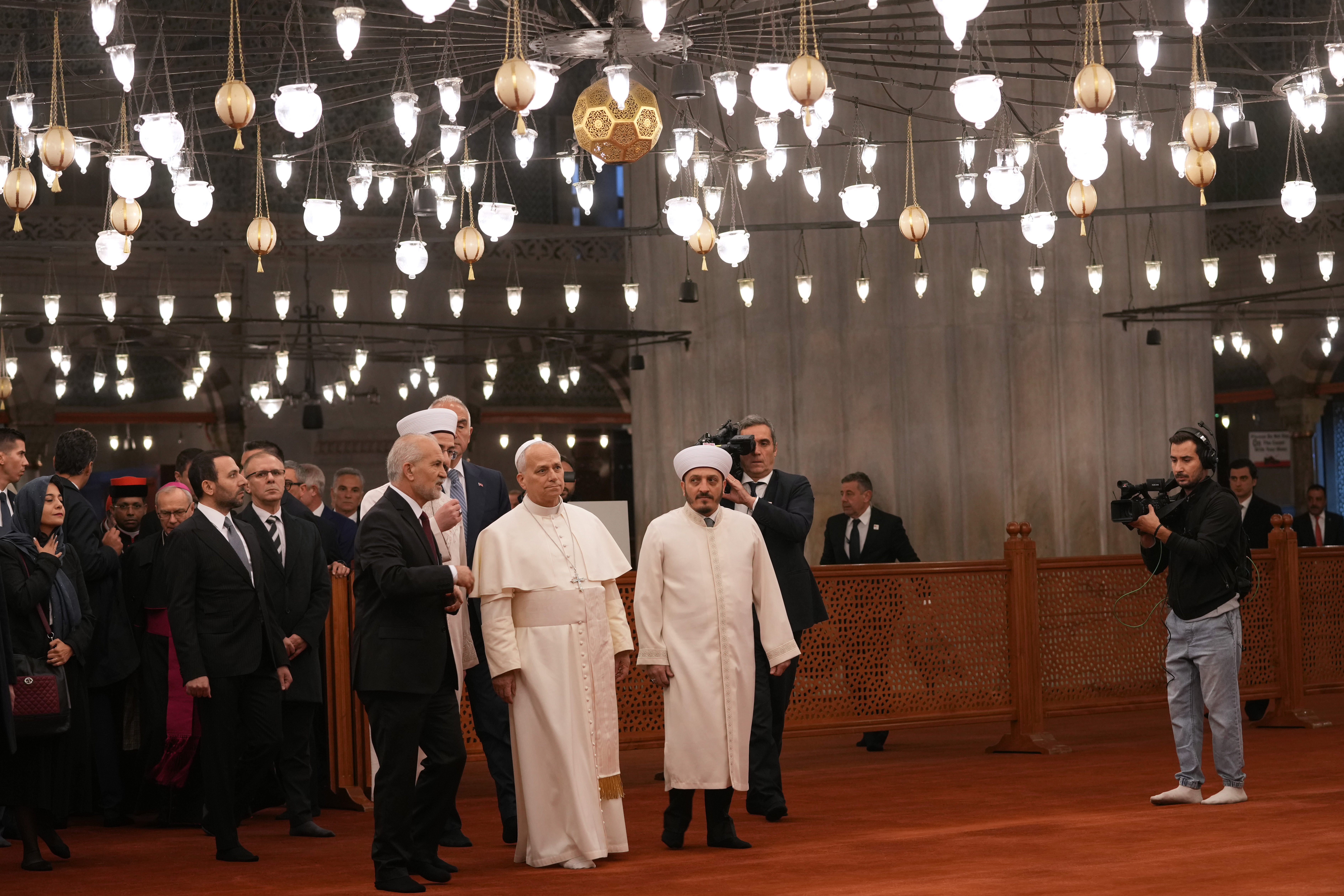 Pope visits Istanbul's Blue Mosque without praying as he focuses on unifying Christians