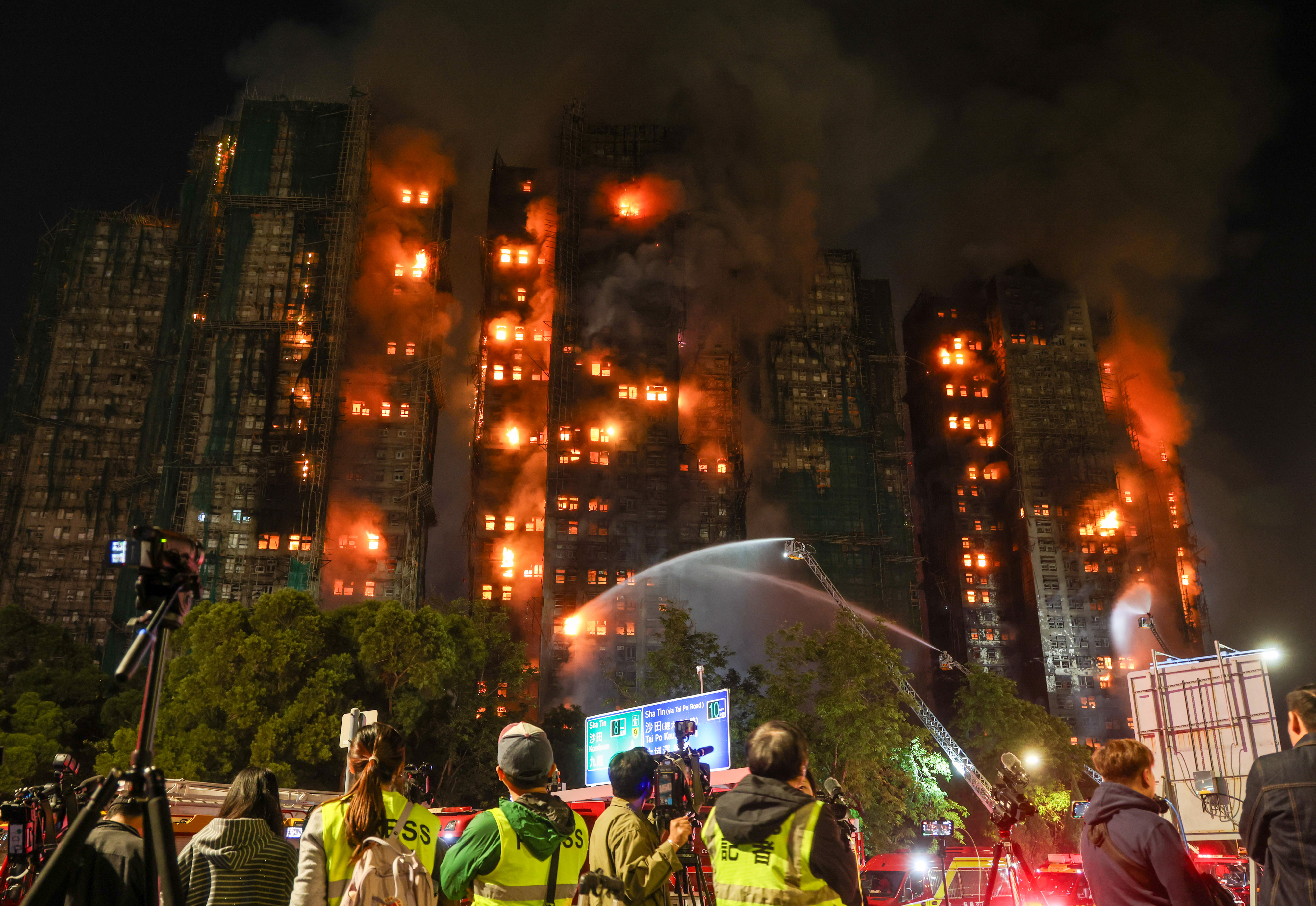 Death toll in Hong Kong apartment complex blaze rises to 146 as the city mourns