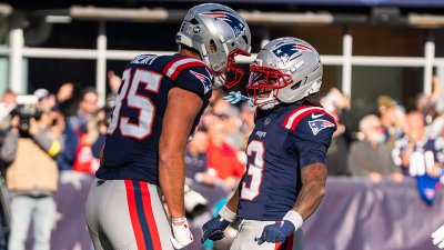 Patriots tight end Hunter Henry and wide receiver DeMario Douglas