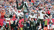 Nov 9, 2025; Tampa, Florida, USA; Tampa Bay Buccaneers wide receiver Tez Johnson (15) flips while celebrating a touchdown during the third quarter against the New England Patriots at Raymond James Stadium. Mandatory Credit: Jonathan Dyer-Imagn Images