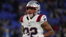 Patriots running back TreVeyon Henderson