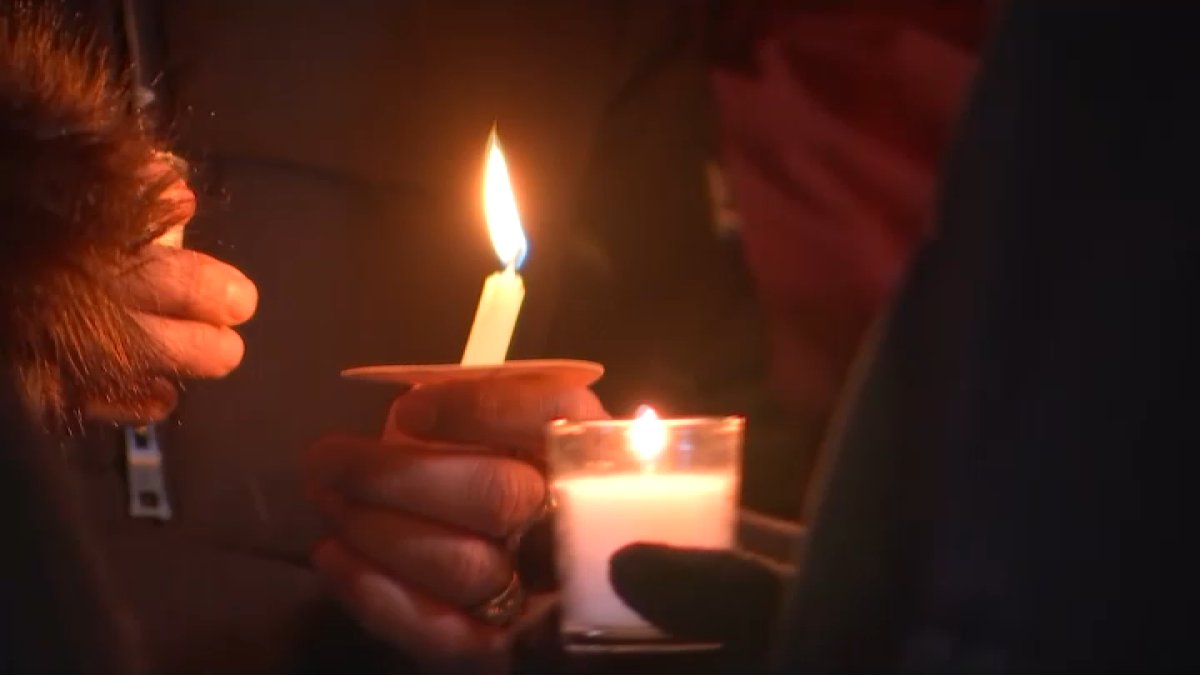 Community gathers for vigil honoring victims of Brown University shooting