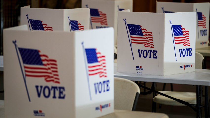 FILE- Voting booths are set up at a polling place in Newtown, Pa, April 23, 2024.