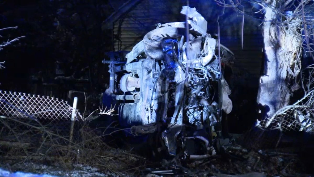 2 people trapped after truck crashes into Randolph house, flips over