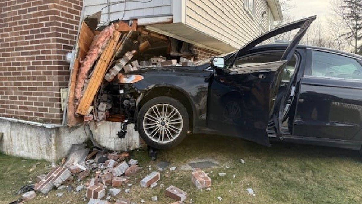 Car crashes into Raynham home after driver suffers medical episode
