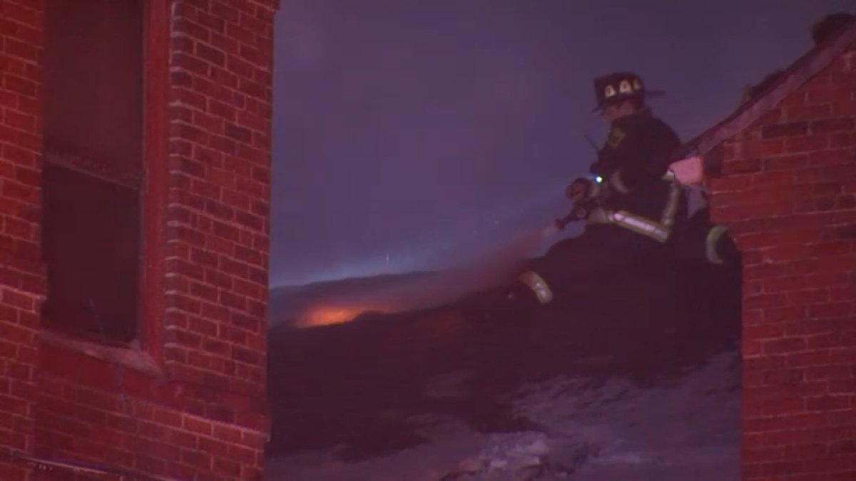 Snow banks, brutal cold challenge crews battling overnight fire in Roxbury