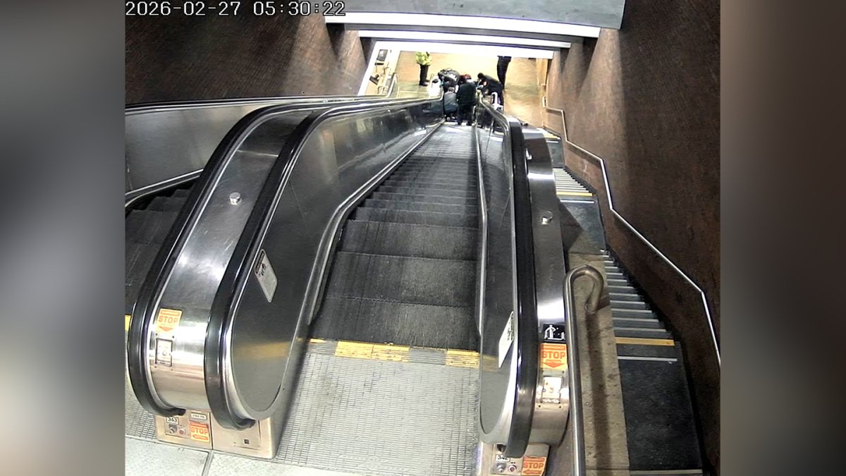 How did a man die after getting caught in an MBTA escalator?