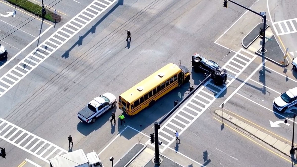 Pickup truck overturns in crash with school bus in Plymouth