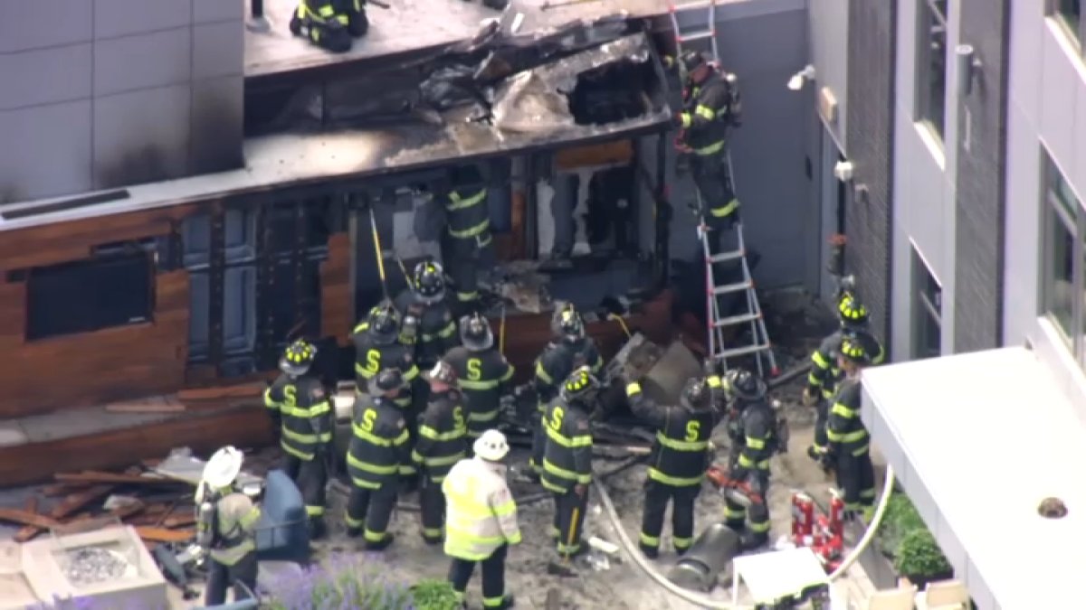 Fire reported on roof of Assembly Row condo building, nearby hotel evacuated