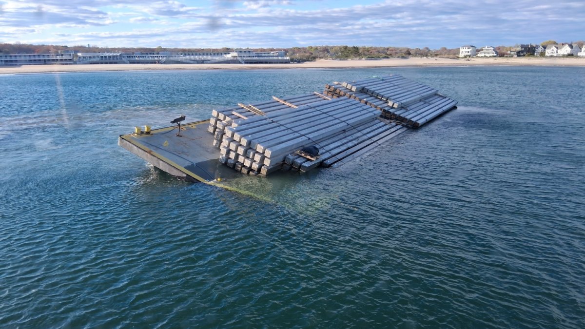 Barge carrying pilings bound for Logan airport saved from sinking off RI