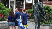 Scotland fans walk by a statue of Mayor Kevin White in Boston ahead of their 2026 FIFA World Cup match against Morocco, on Friday, June 19, 2026.