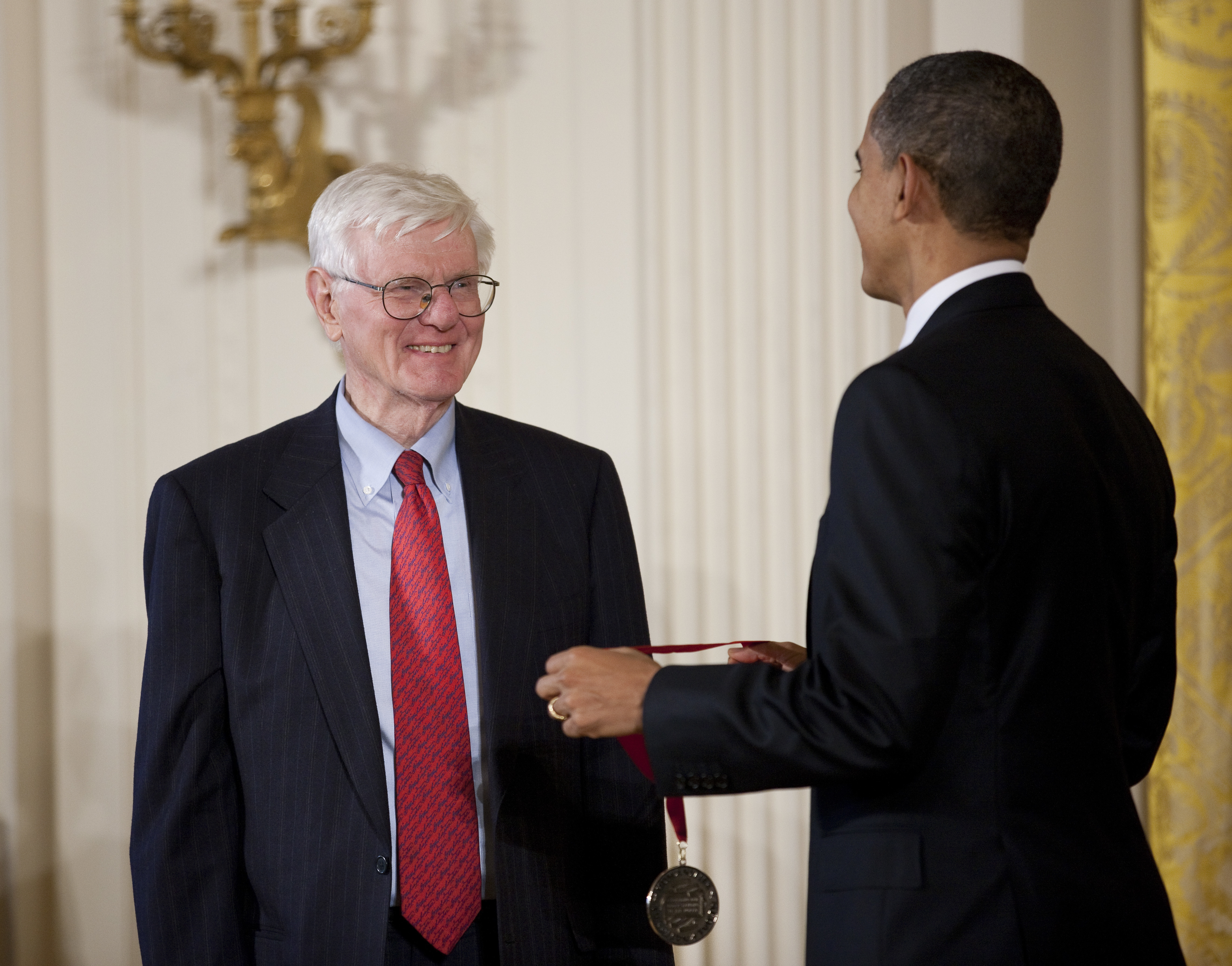 This March 2, 2011, photo shows President Barack Obama present a National Humanities Medal to author, historian and Brown University professor emeritus Gordon Wood during a ceremony in the East Room of the White House.
