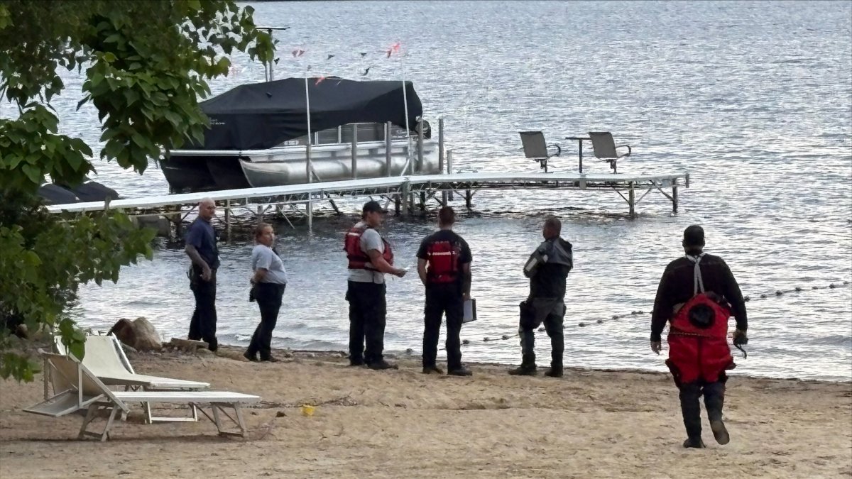 Police searching for missing person in Lakeville pond
