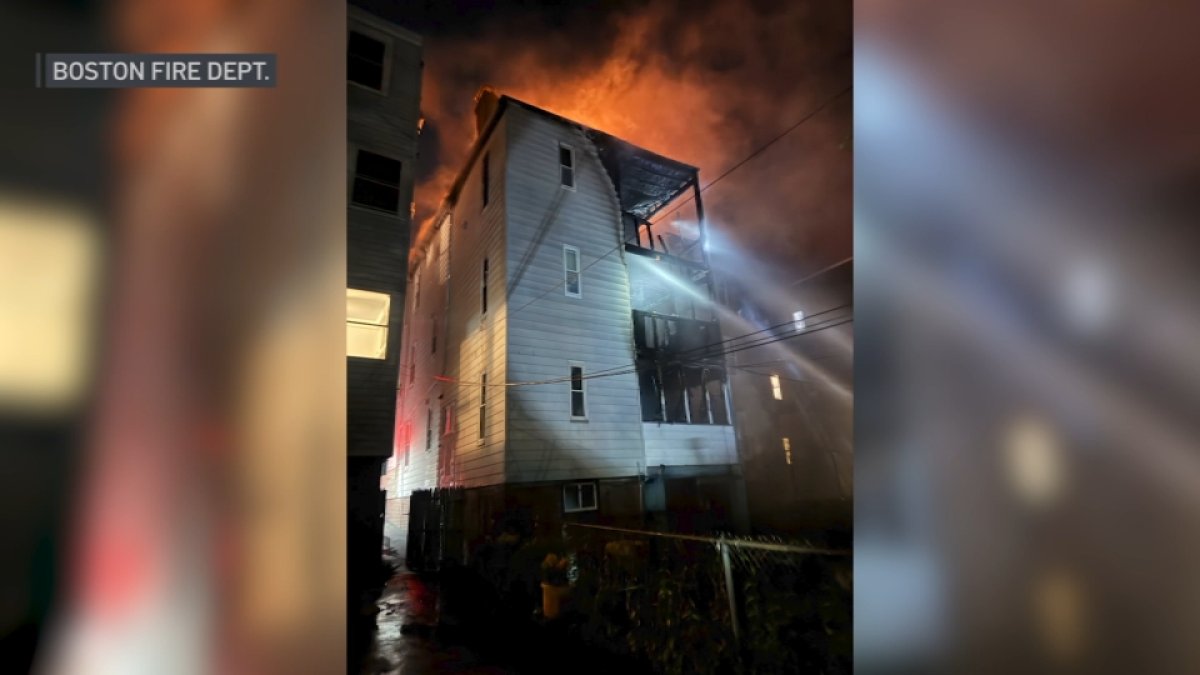 Firefighter hurt in fire at South Boston triple-decker that spread to home next door
