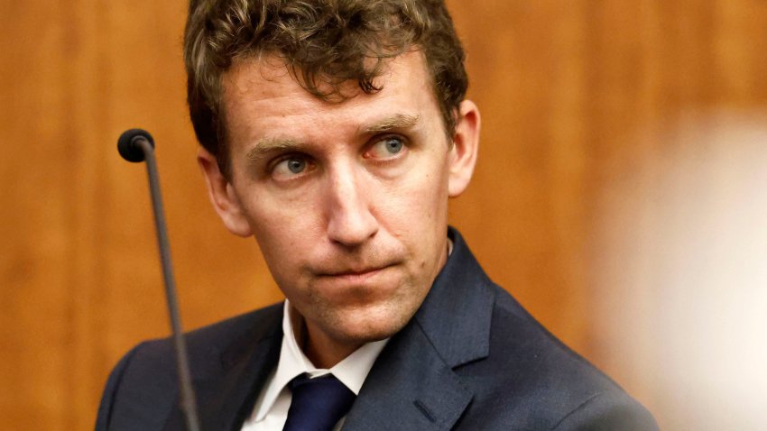 Patrick Clancy glances over at the defense table and his ex-wife Lindsay Clancy as he is seated to testify in the murder trial of Lindsay Clancy murder trial at Plymouth Superior Court in Plymouth, Massachusetts on Monday, July 27, 2026.