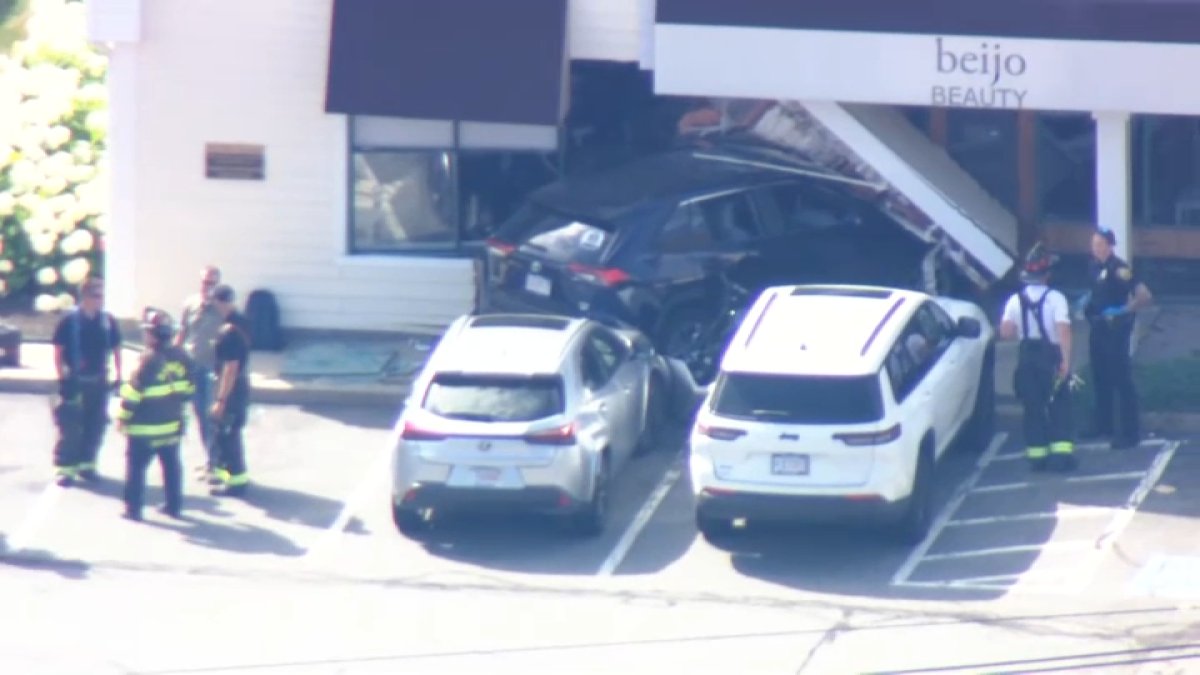3 hospitalized after vehicle crashes into Danvers business