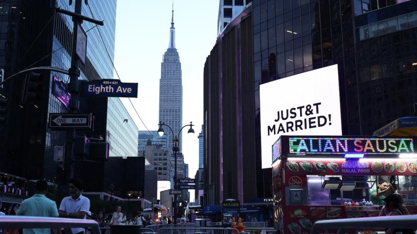 The Empire State Building is seen in the distance as a giant screen showing the message "JUST&T MARRIED!" is displayed outside Madison Square Garden.