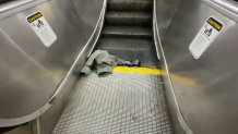A piece of clothing in an escalator at the Davis Square MBTA station in Somerville, Massachusetts, on Friday, July 31, 2026, after a woman was hurt.