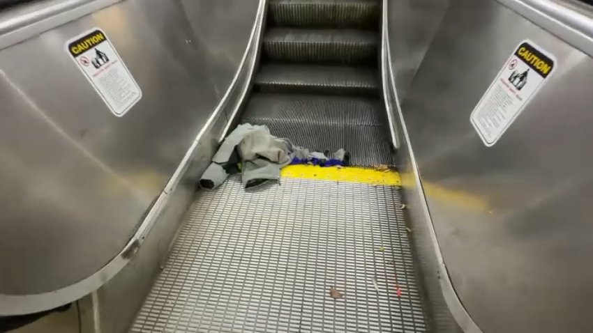 A piece of clothing in an escalator at the Davis Square MBTA station in Somerville, Massachusetts, on Friday, July 31, 2026, after a woman was hurt.