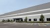 Shipping giant to open its largest Mass. site, bringing 1,000 new jobs