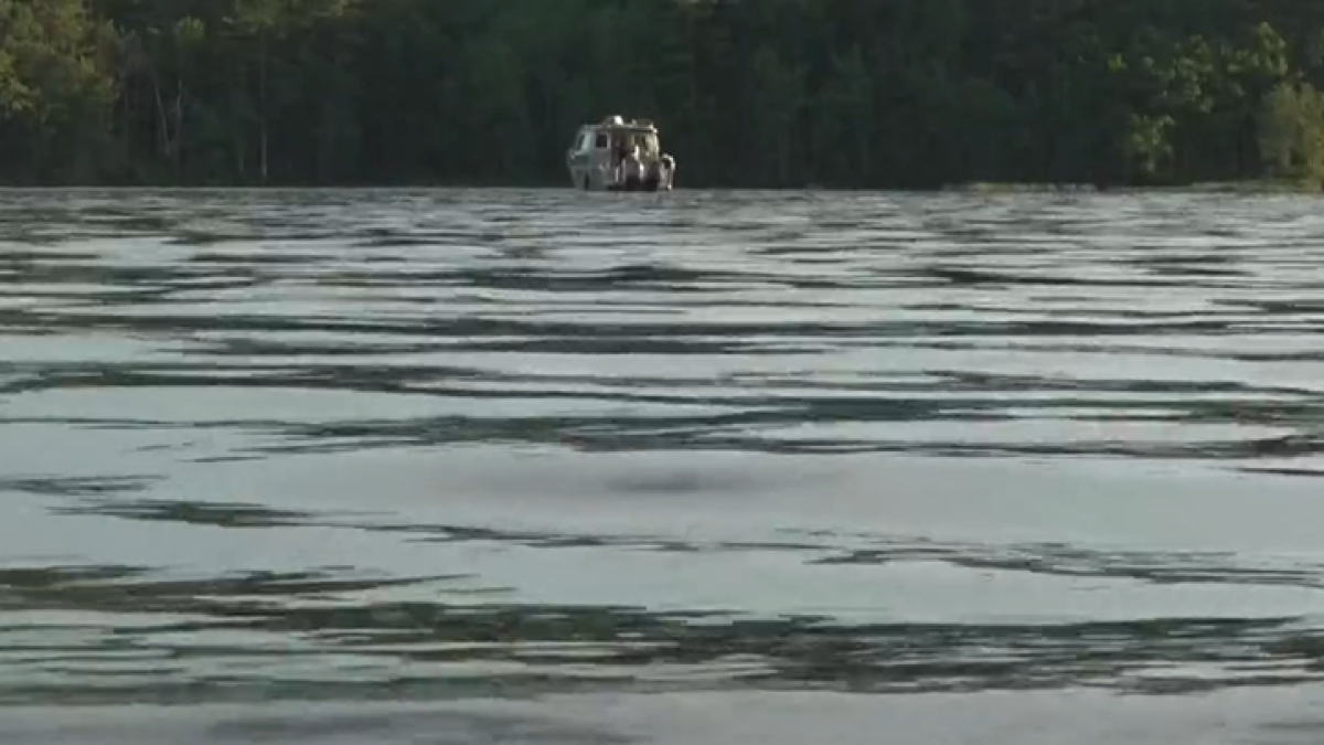 Divers recover body of man who went missing while paddleboarding with family