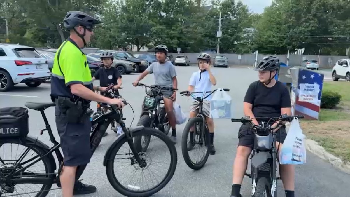 Braintree police are stopping young cyclists to reward them for helmet use