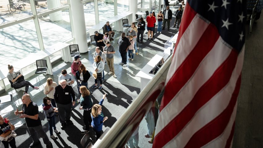 STAMFORD, CONNECTICUT – OCTOBER 21: Voters line up to cast their ballots at the Stamford Government Center on the first day of early voting on October 21, 2024 in Stamford, Connecticut. This is the first time that Connecticut residents can vote early in a presidential election, following a state constitutional amendment approved by voters in 2022. Voters have access to at least one location in each of the state’s 169 municipalities until Sunday, November 3. Early voting hours will run most days from 10 a.m. until 6 p.m. (Photo by John Moore/Getty Images)