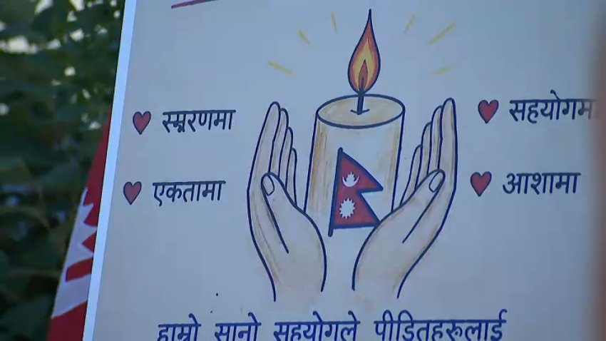Artwork at a vigil for the victims of the flooding in Nepal.
