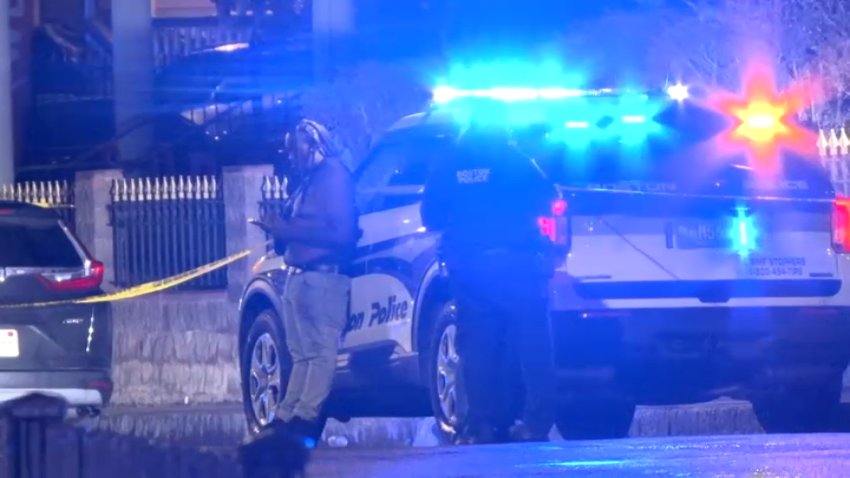 Police at the scene of the stabbing in Dorchester.