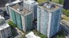 Boston towers to be sold as part of merger of residential giants