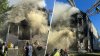 Firefighters battle large fire in multi-family home in Brighton