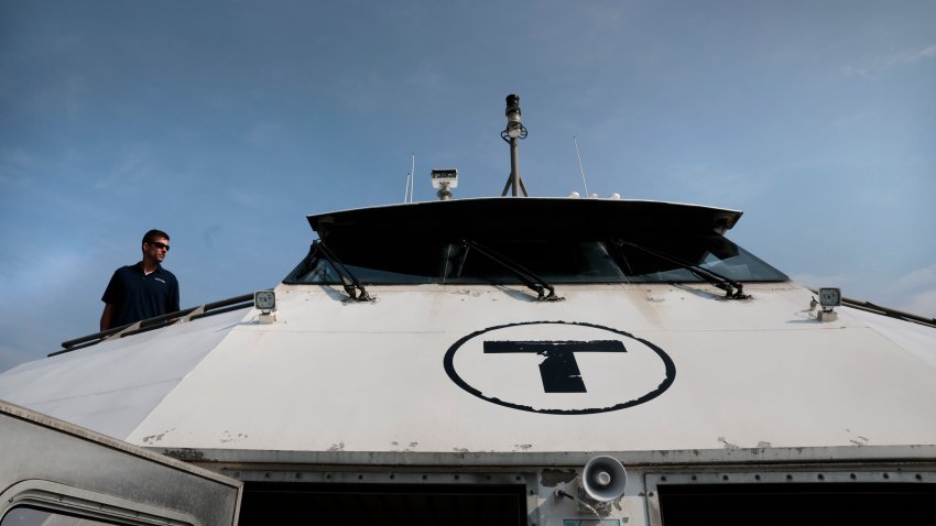 Boston, MA - July 13: Captain Mike Stevens looks over the MBTA Hingham/Hull Ferry before departing Long Wharf North terminal. (Photo by Craig F. Walker/The Boston Globe via Getty Images)