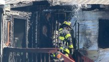 Malden firefighter at the scene of the fire.